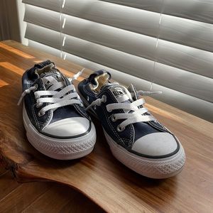 Blue slip on Converse.